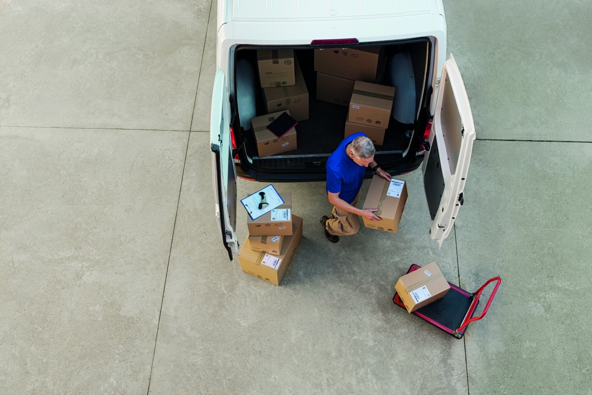 A man unloading a van, getting a birds-eye view