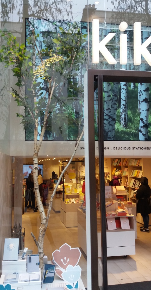 At kikki.K, a large birch tree (real trunk, artificial foliage) takes up the...