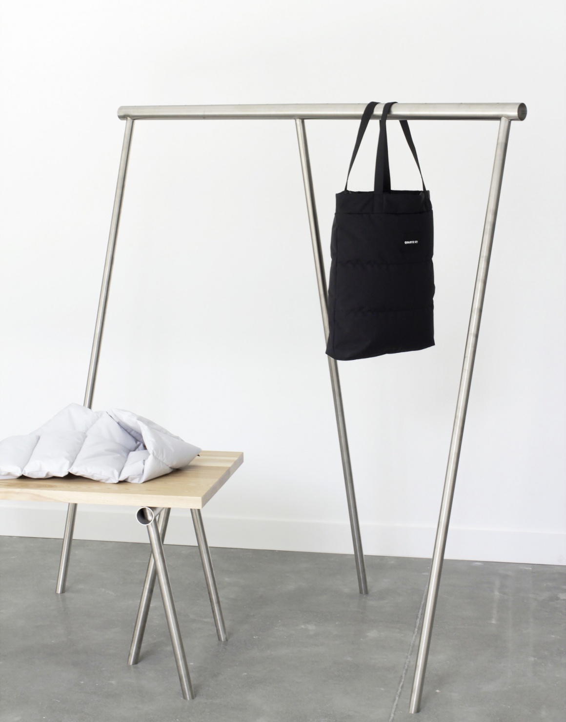 Modern, very simple shelf and table in a fashion showroom...