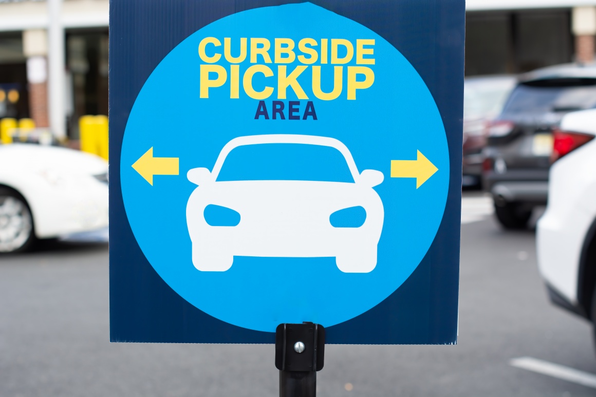 Sign showing instructions for curbside pickup