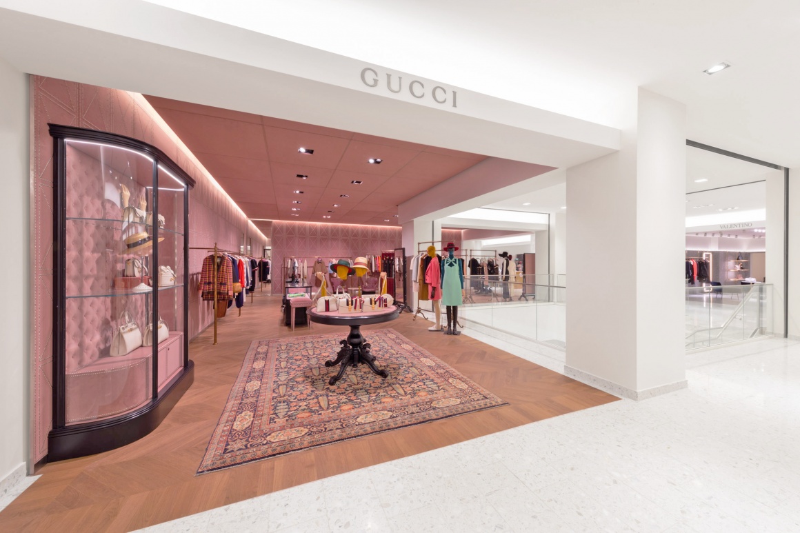 Gucci store, pink colors, minimalist furnishing